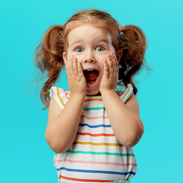 A young girl celebrating